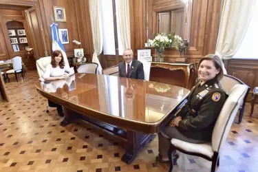 Cristina Fernández de Kirchner junto a Marc Stanley y Laura Jane Richardson.