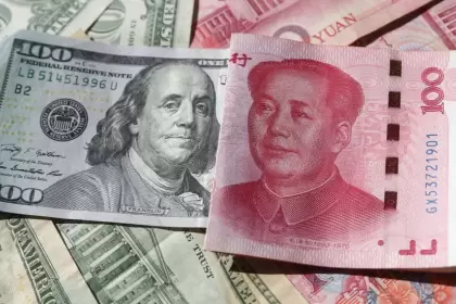 El yuan se continúa acercando al dólar