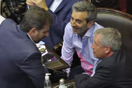 Cristian Ritondo y Florencio Randazzo, en la Cámara de Diputados junto a Emilio Monzó.