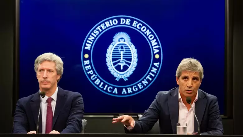 Santiago Bausili y Luis Caputo
