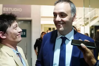 Manuel Adorni con Santiago Caputo