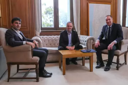 Torres, Adorni y Santilli en la Casa Rosada