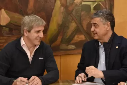 Luis Caputo y Jorge Macri, durante el acuerdo por la coparticipación